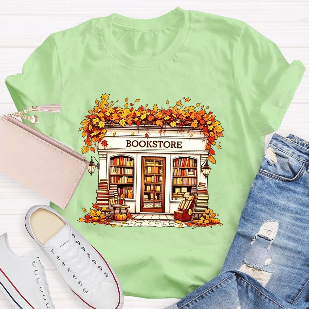 Fall Autumn Bookstore Building Maple Leaves Pumpkin Book Lover Teacher T-shirt