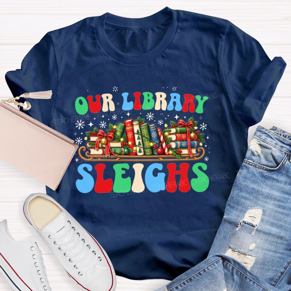 Our Library Sleighs Library Books And Christmas Cheer Teacher T-shirt