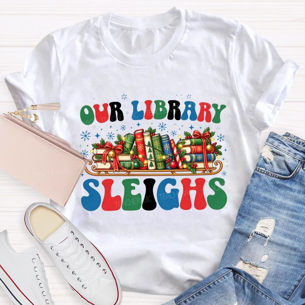 Our Library Sleighs Library Books And Christmas Cheer Teacher T-shirt