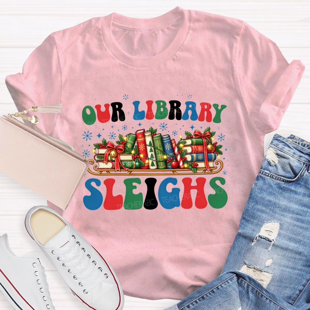 Our Library Sleighs Library Books And Christmas Cheer Teacher T-shirt