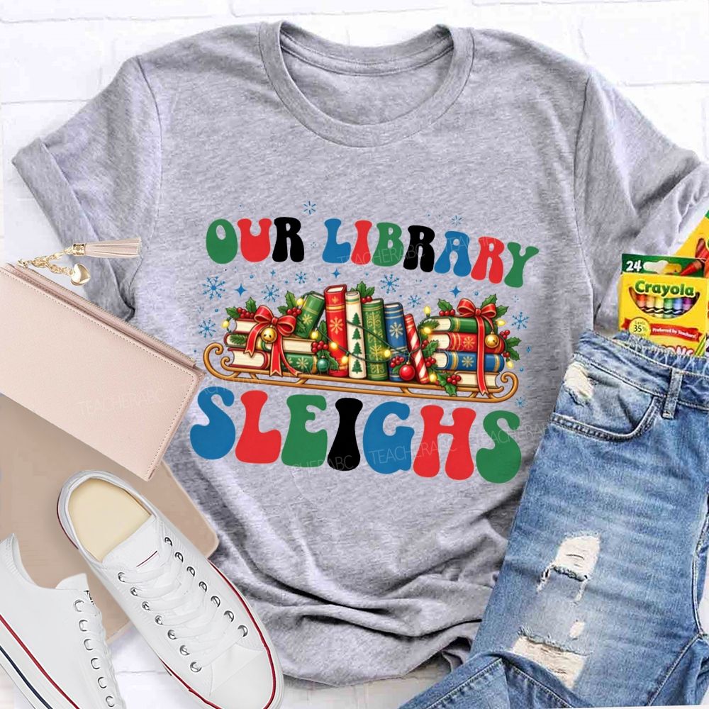 Our Library Sleighs Library Books And Christmas Cheer Teacher T-shirt
