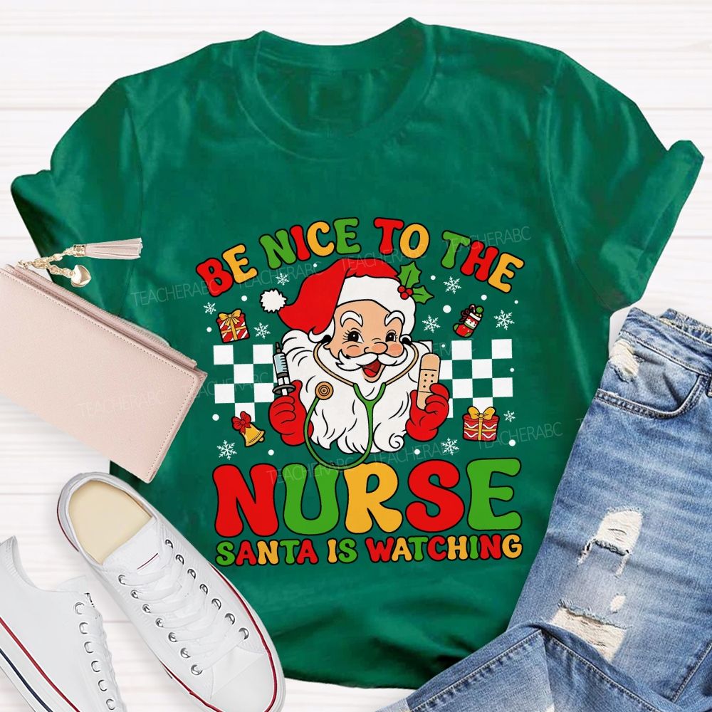 Be Nice To The Nurse Santa Is Watching Santa Claus With A Stethoscope Teacher T-shirt