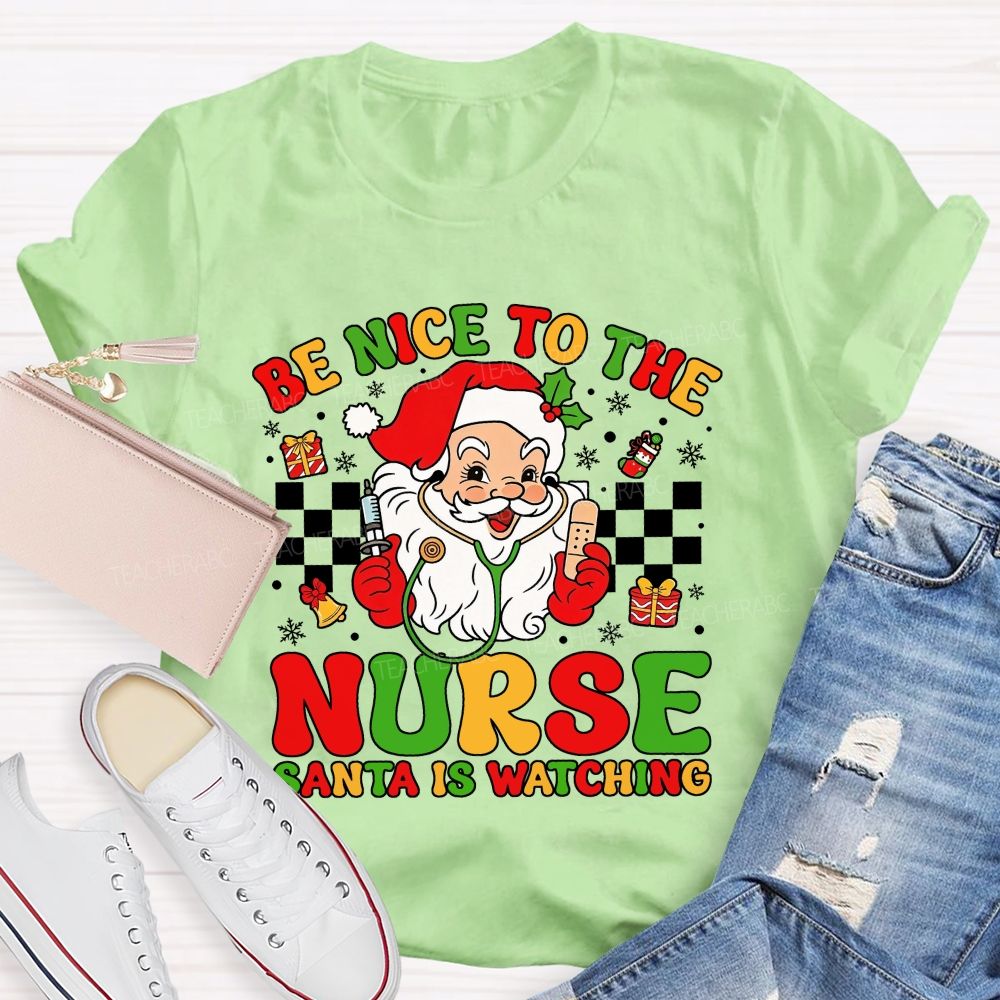 Be Nice To The Nurse Santa Is Watching Santa Claus With A Stethoscope Teacher T-shirt