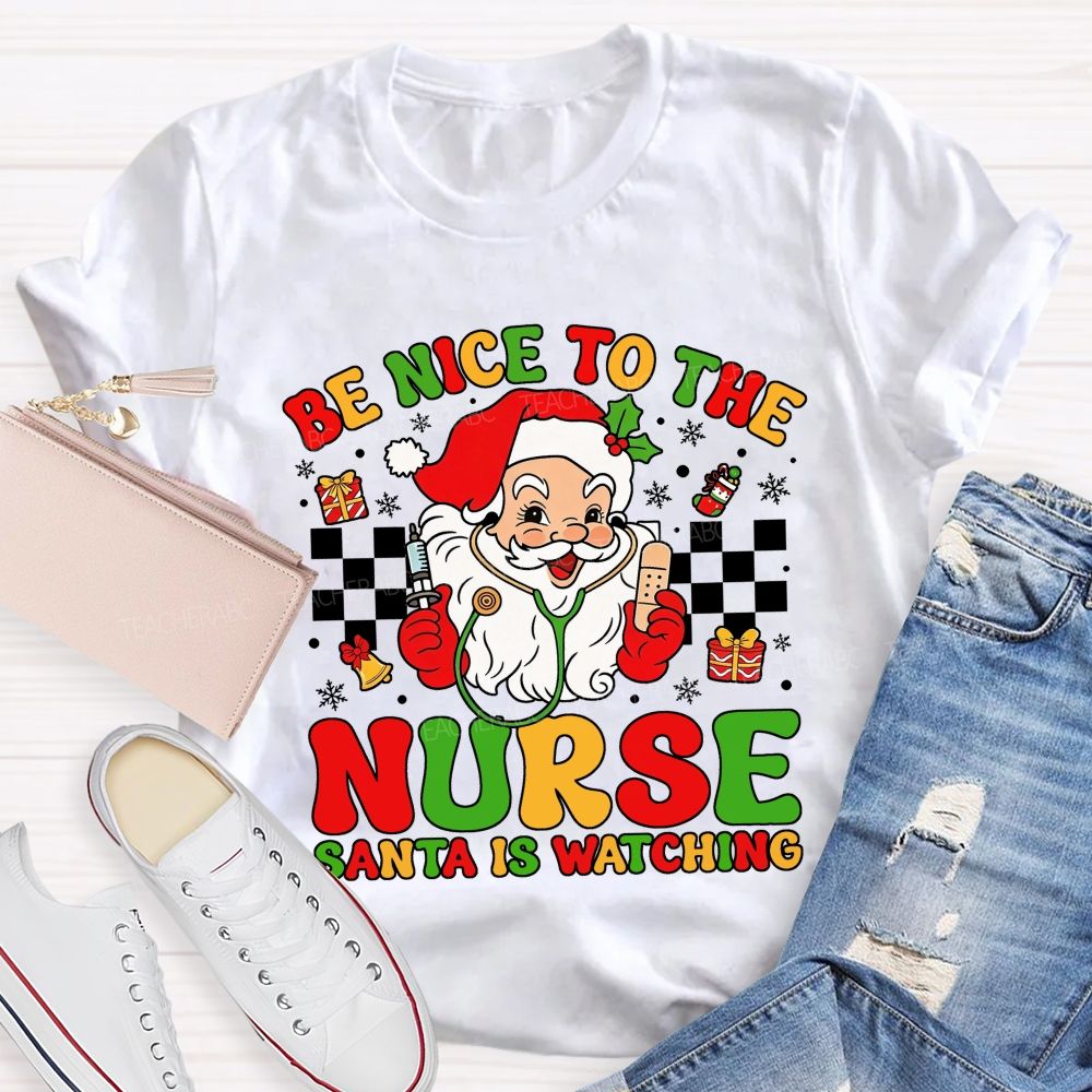 Be Nice To The Nurse Santa Is Watching Santa Claus With A Stethoscope Teacher T-shirt