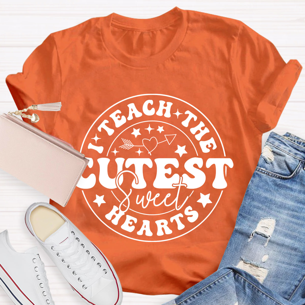 I Teach The Cutest Sweat Heart Teacher T-Shirt