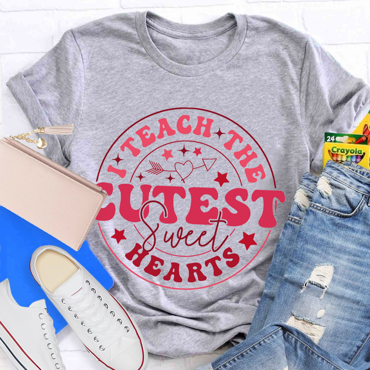 I Teach The Cutest Sweat Heart Teacher T-Shirt