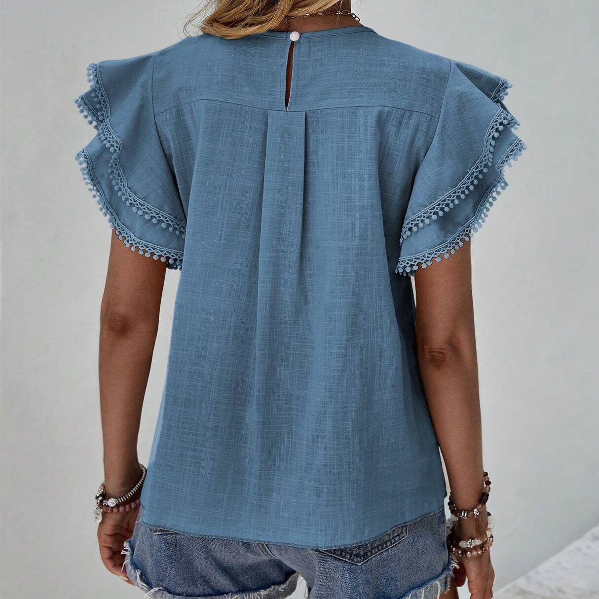 Round Neck Shirt With Ruffles And Batwing Top