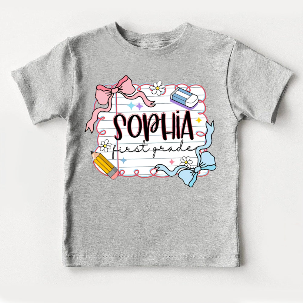 Personalized Name And Grade First Grade Cute Bows And School Supplies Toddler T-shirts