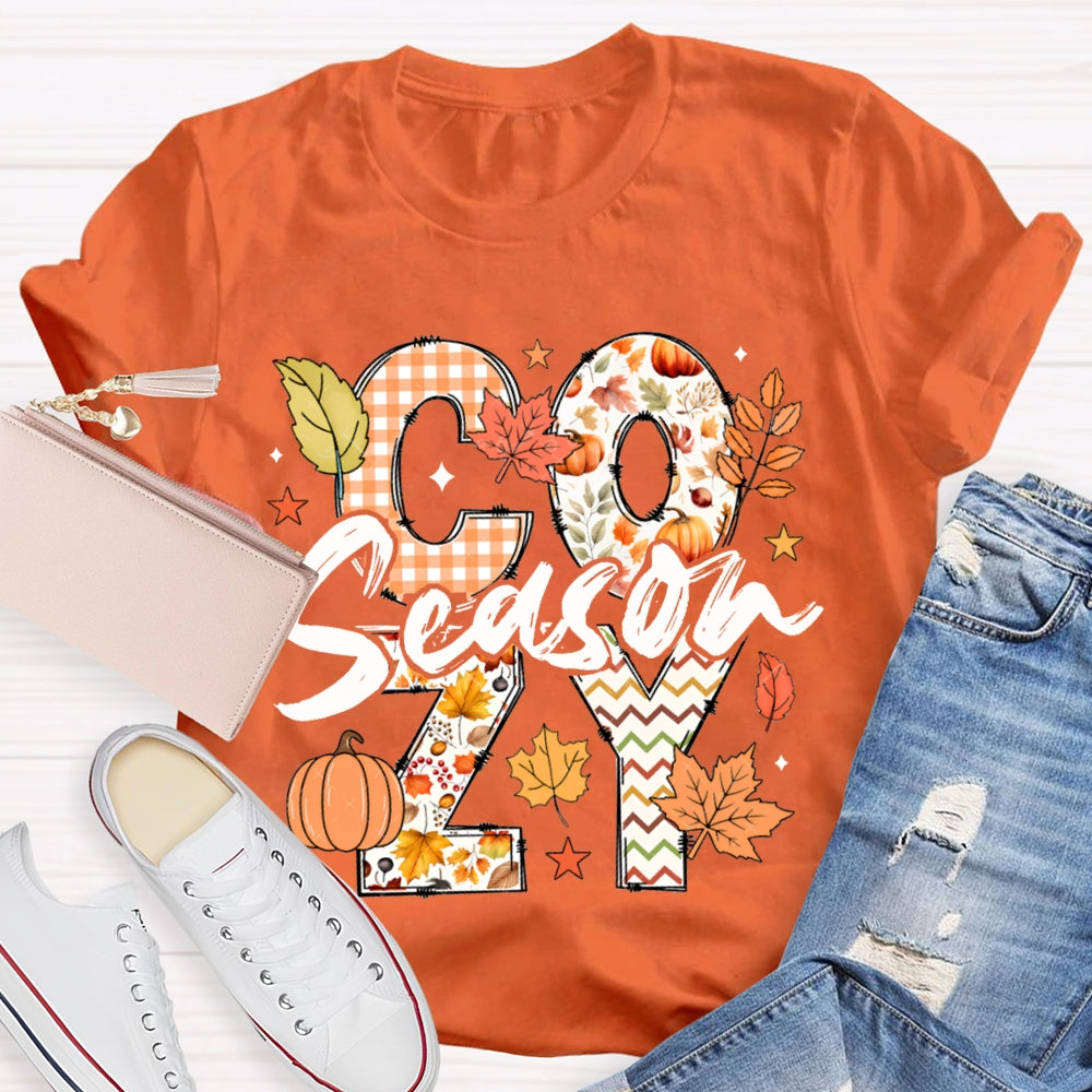 Cozy Season Pumpkin Maple Leaves And Colorful Fonts T-shirt