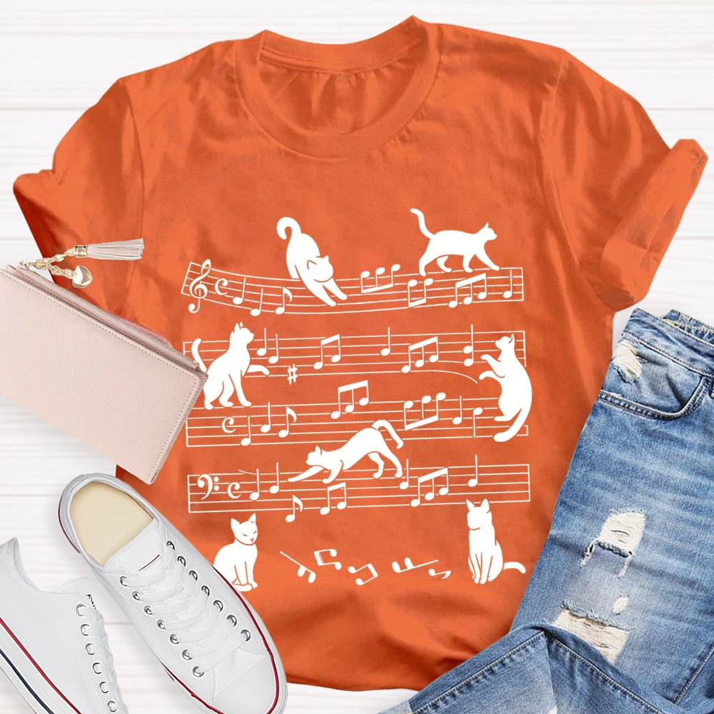 A Group Of Kittens Dancing On Musical Notes Music Teacher T-shirt