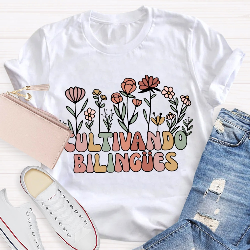 Cultivando Bilingues Colorful Fonts And Small Flowers Bilingual Teacher T-shirt