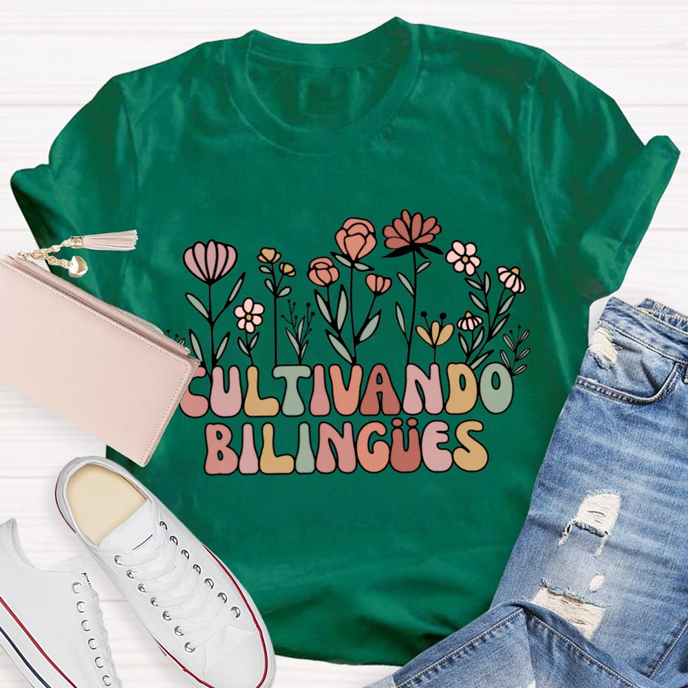 Cultivando Bilingues Colorful Fonts And Small Flowers Bilingual Teacher T-shirt