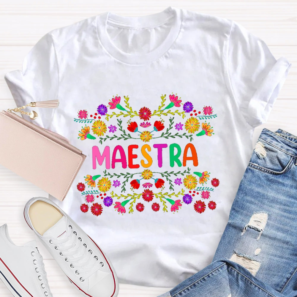 Maestra Colorful Bouquets And Colorful Fonts Bilingual Teacher T-shirt
