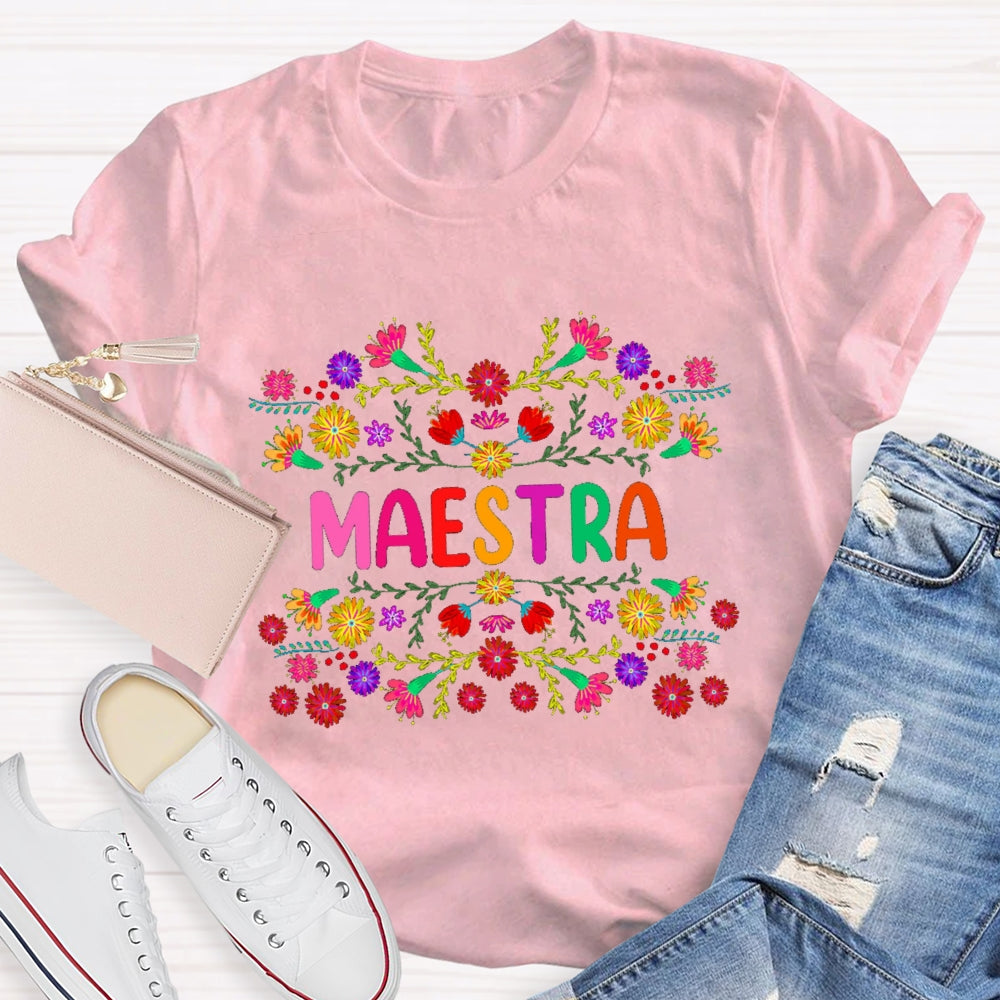 Maestra Colorful Bouquets And Colorful Fonts Bilingual Teacher T-shirt