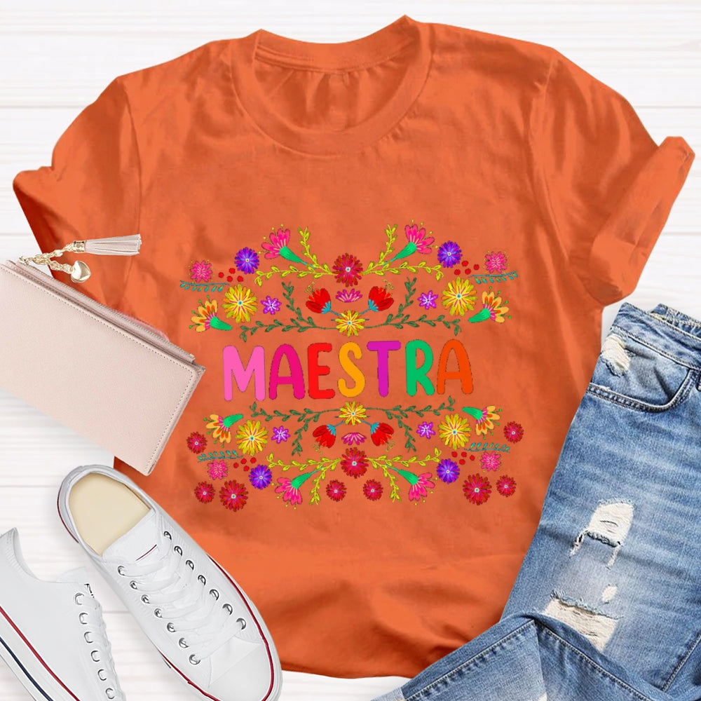 Maestra Colorful Bouquets And Colorful Fonts Bilingual Teacher T-shirt