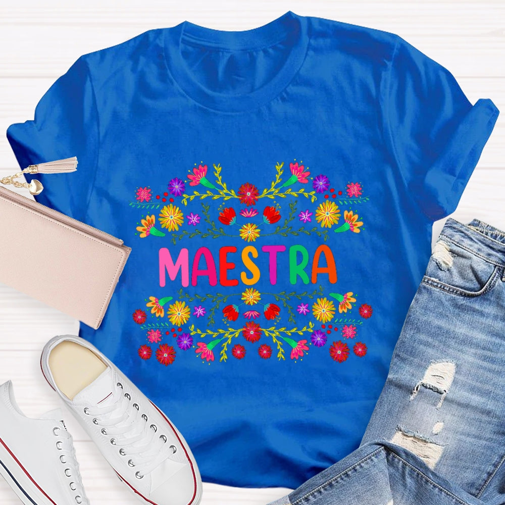 Maestra Colorful Bouquets And Colorful Fonts Bilingual Teacher T-shirt