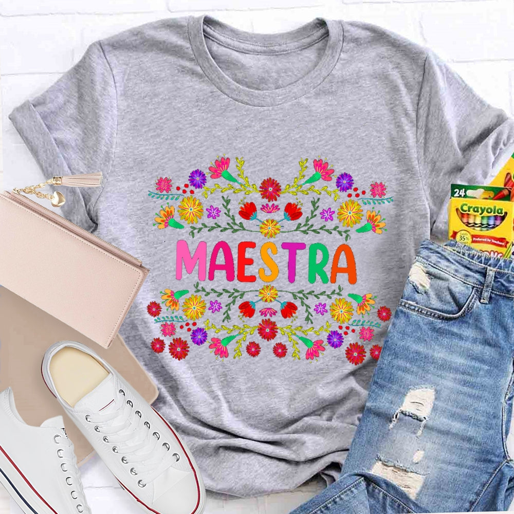 Maestra Colorful Bouquets And Colorful Fonts Bilingual Teacher T-shirt