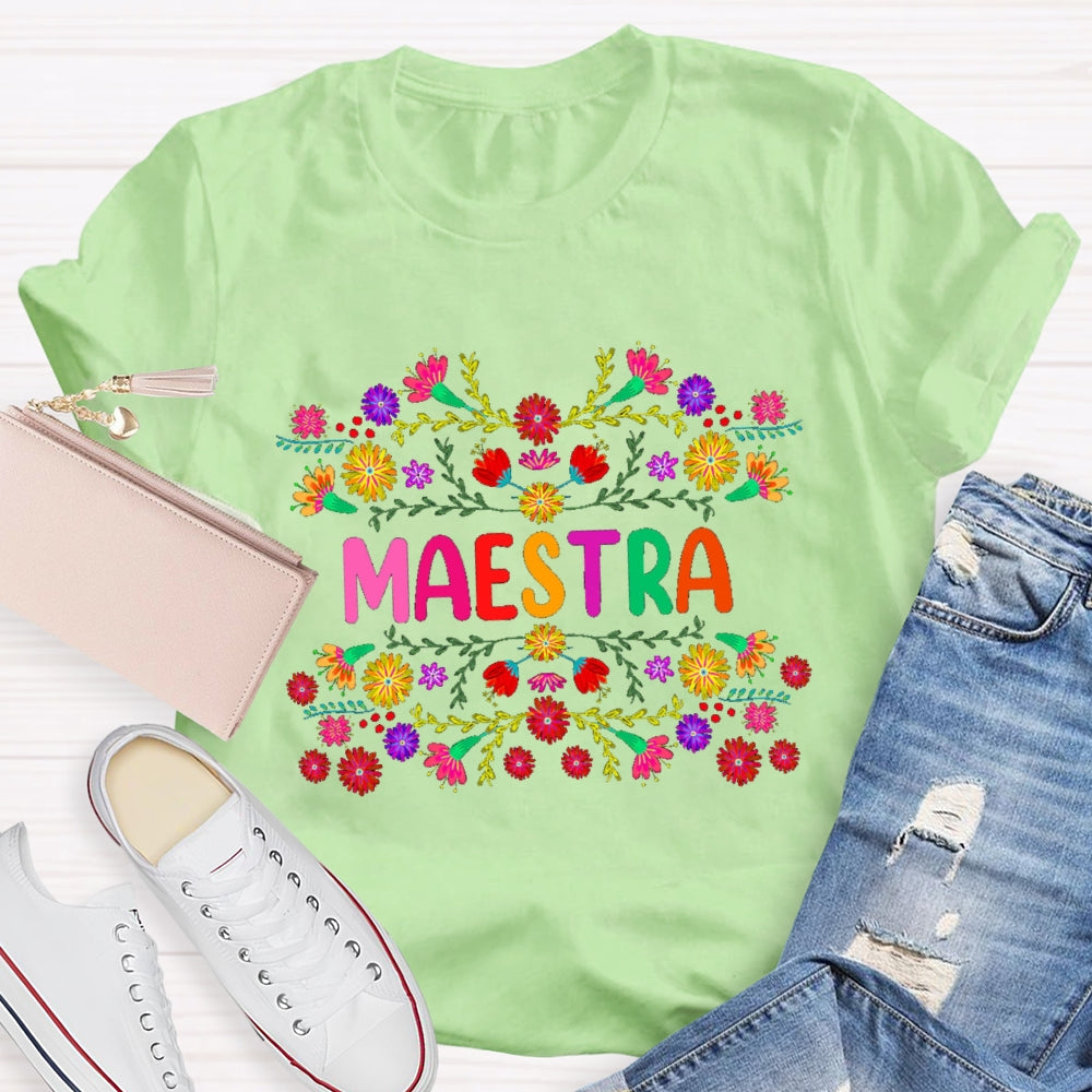 Maestra Colorful Bouquets And Colorful Fonts Bilingual Teacher T-shirt