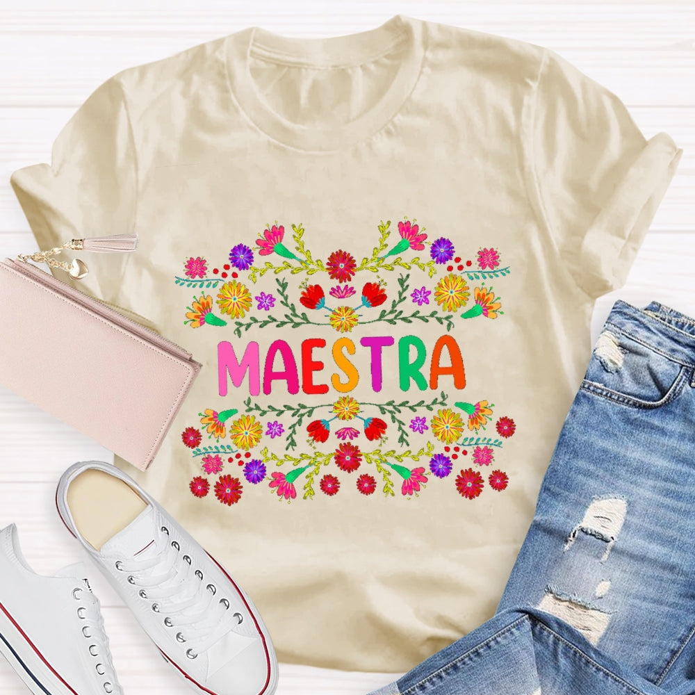 Maestra Colorful Bouquets And Colorful Fonts Bilingual Teacher T-shirt