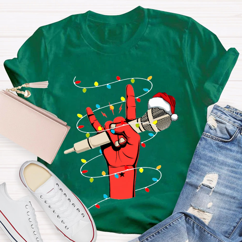 Holding A Microphone Wearing A Santa Hat And Christmas Lights T-shirt