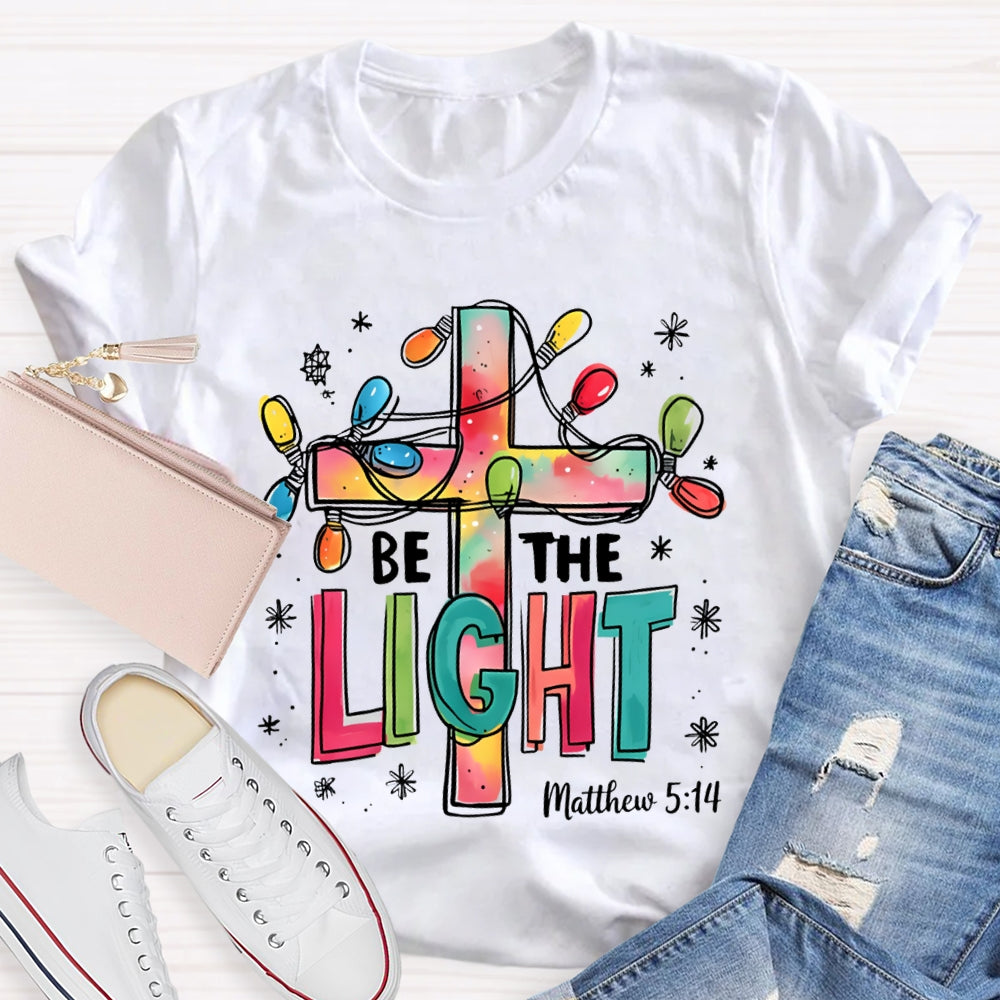 Be The Light Matthew Colorful Fonts And Christmas Lights T-shirt