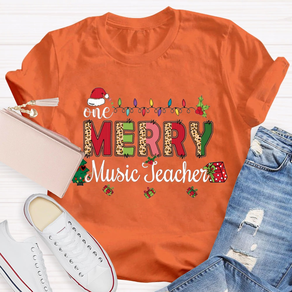 Merry Music Teacher Christmas Lights And Colorful Leopard Print Font T-shirt