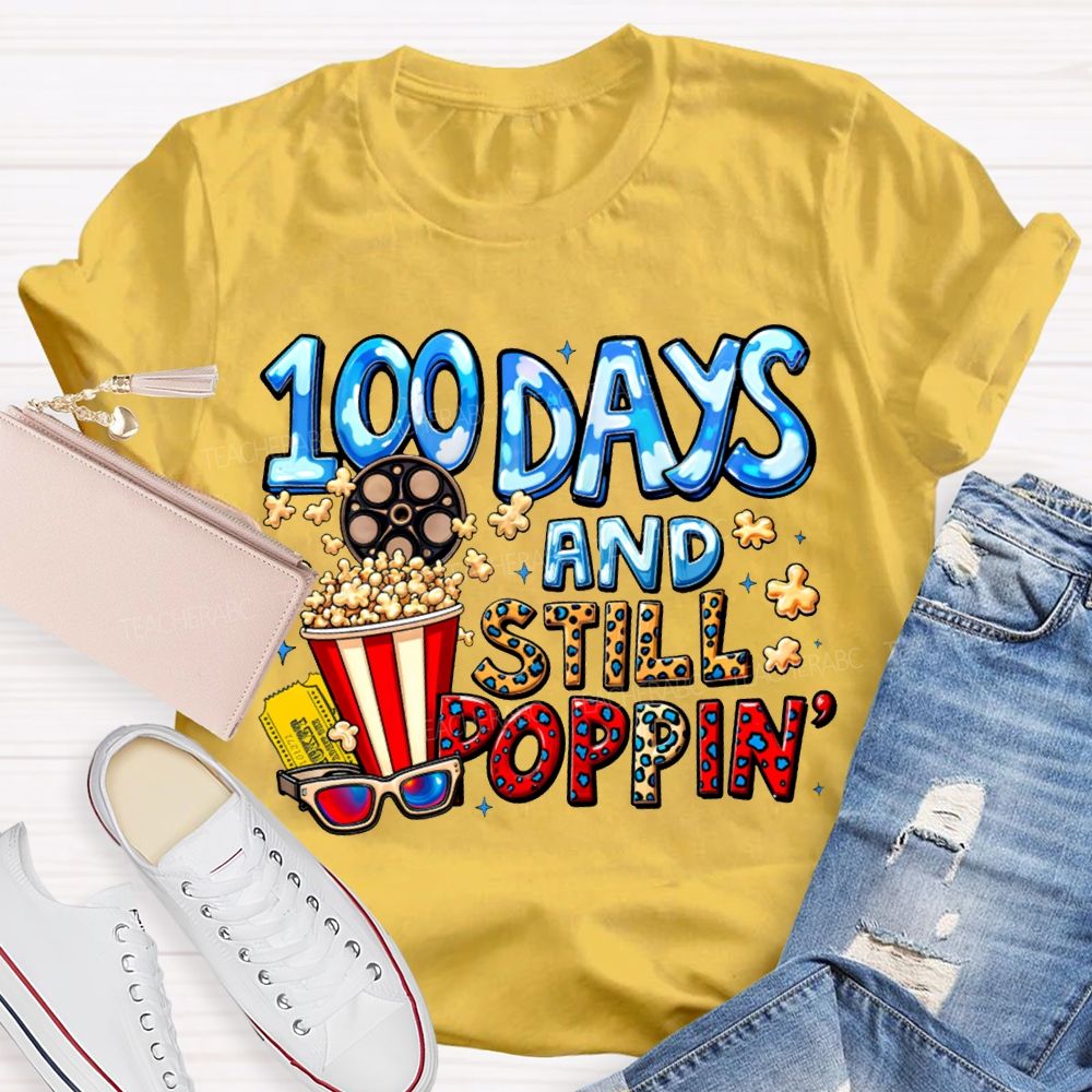 100 Days And Still Poppin Popcorn And Leopard Print Font T-shirt
