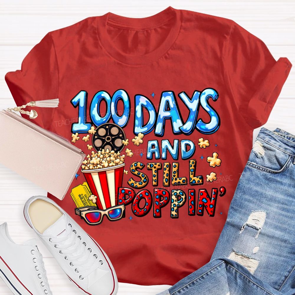 100 Days And Still Poppin Popcorn And Leopard Print Font T-shirt