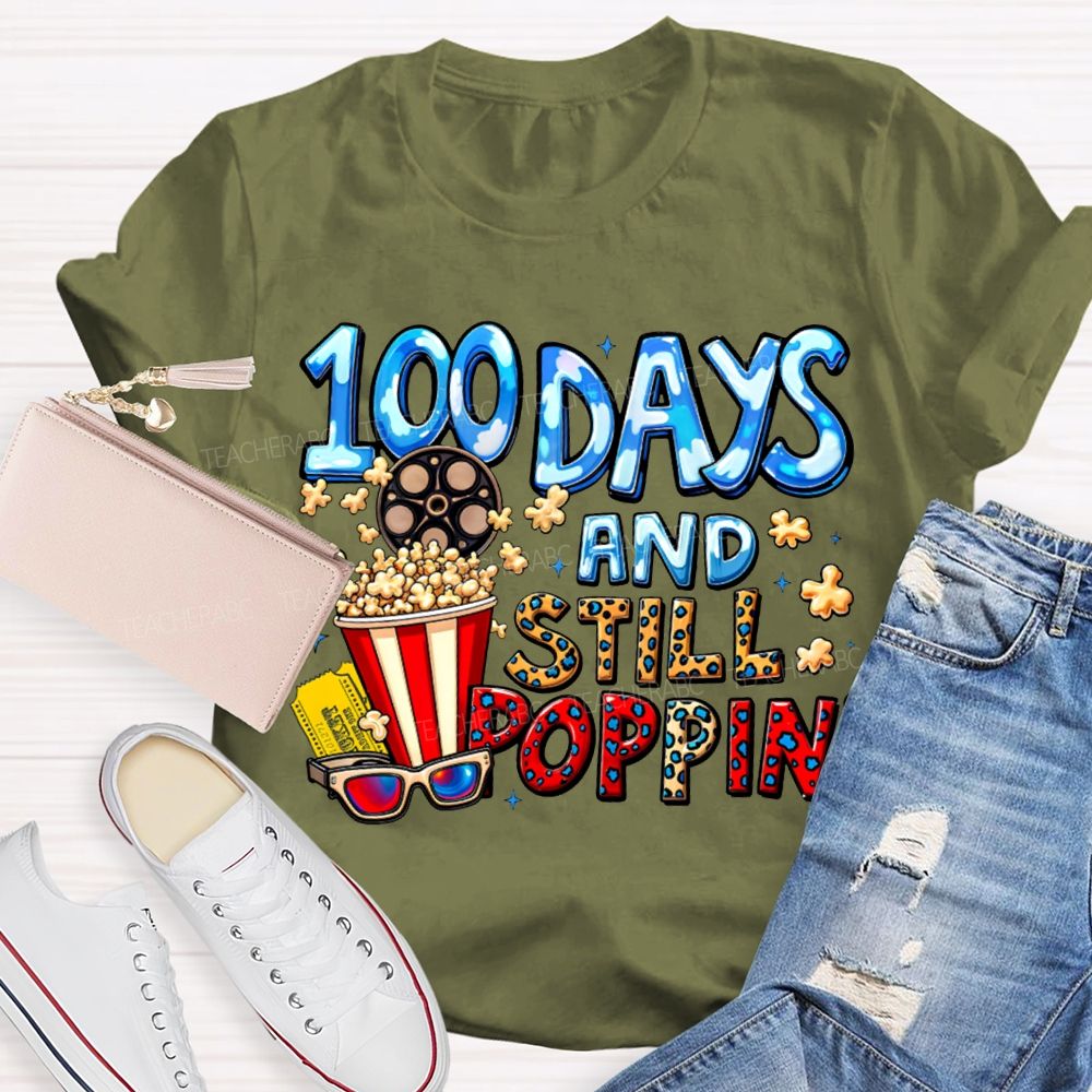 100 Days And Still Poppin Popcorn And Leopard Print Font T-shirt