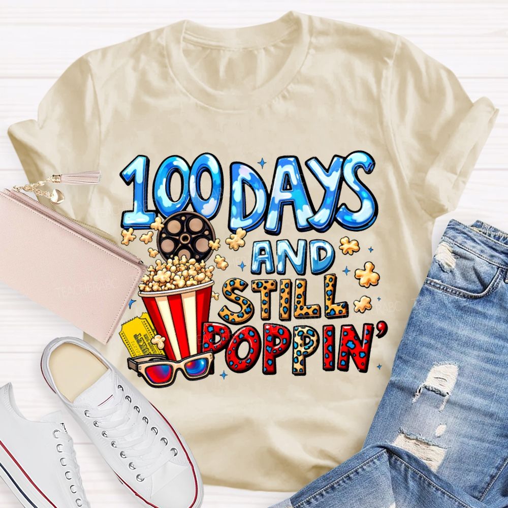 100 Days And Still Poppin Popcorn And Leopard Print Font T-shirt