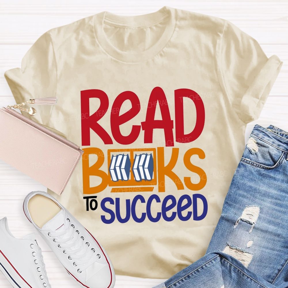 Read Books To Succeed Colored Fonts Teacher T-shirt