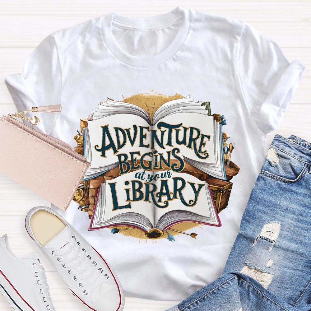 Adventure Begins At Your Library Teacher T-shirt