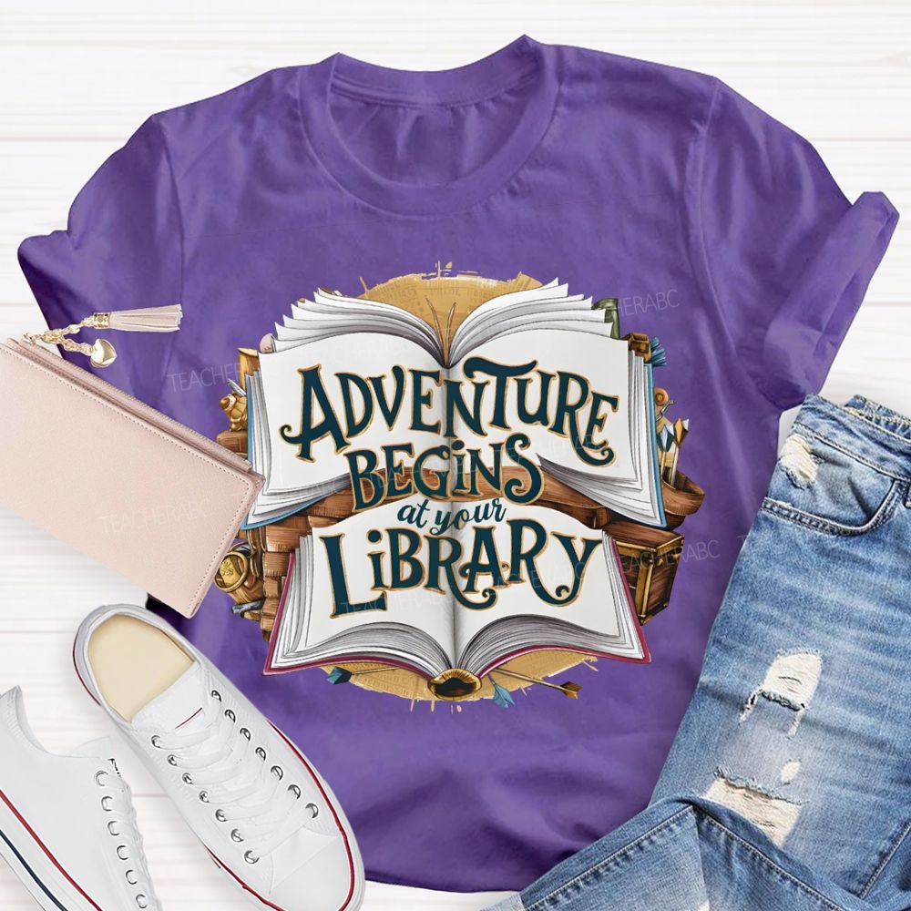 Adventure Begins At Your Library Teacher T-shirt