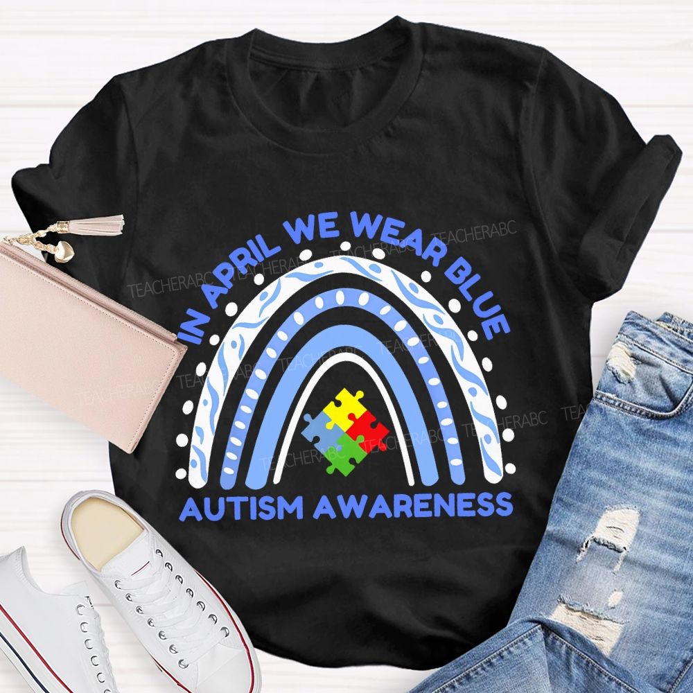 In April We Wear Blue Autism Awareness  Rainbow Puzzles Teacher T-shirt