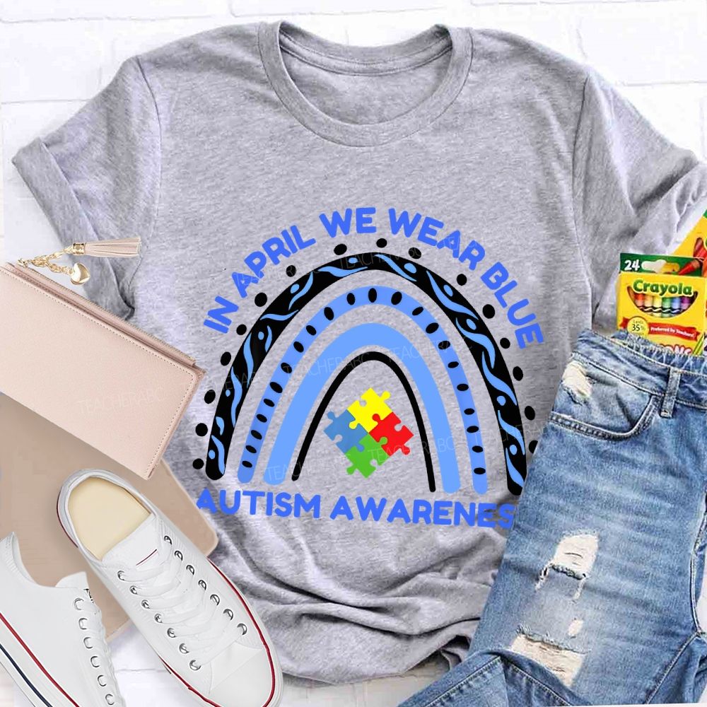 In April We Wear Blue Autism Awareness  Rainbow Puzzles Teacher T-shirt