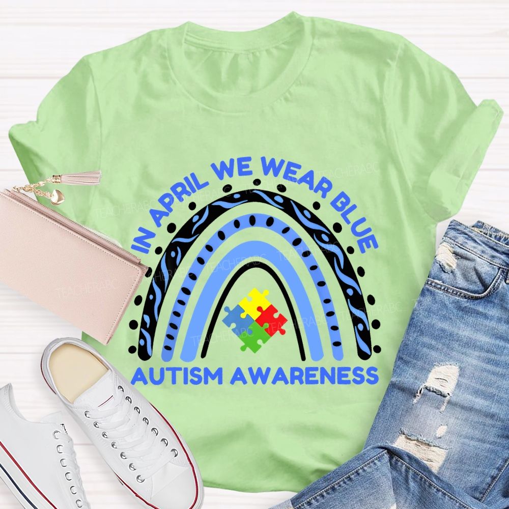 In April We Wear Blue Autism Awareness  Rainbow Puzzles Teacher T-shirt