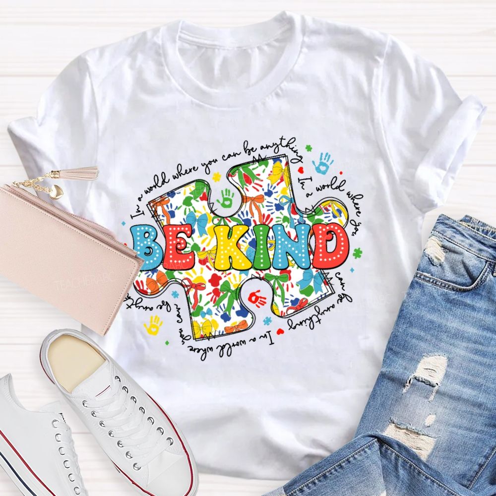 In A World Where You Can Be Anything Be Kind Colorful Letters Puzzle  Teacher T-shirt