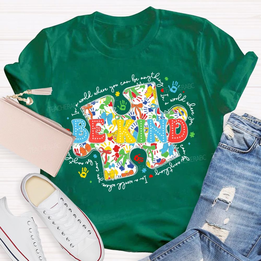 In A World Where You Can Be Anything Be Kind Colorful Letters Puzzle  Teacher T-shirt