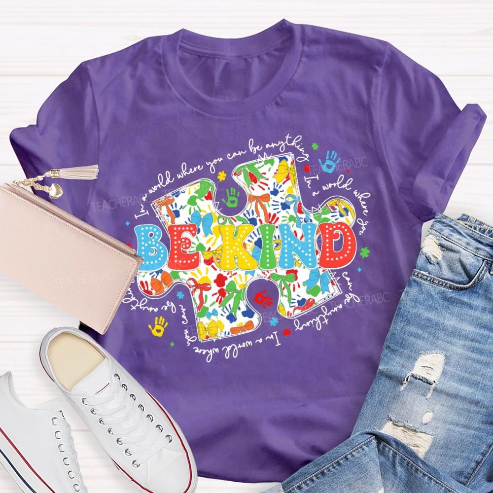 In A World Where You Can Be Anything Be Kind Colorful Letters Puzzle  Teacher T-shirt
