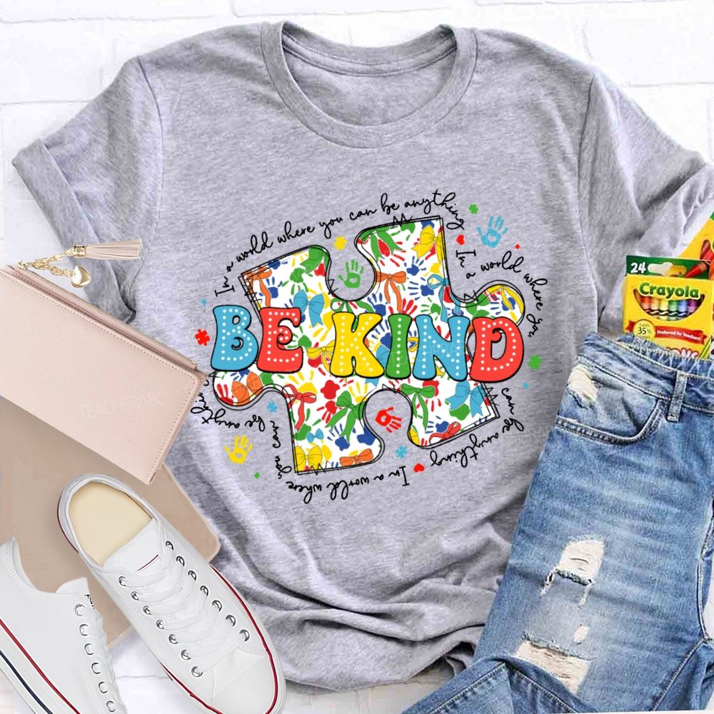 In A World Where You Can Be Anything Be Kind Colorful Letters Puzzle  Teacher T-shirt