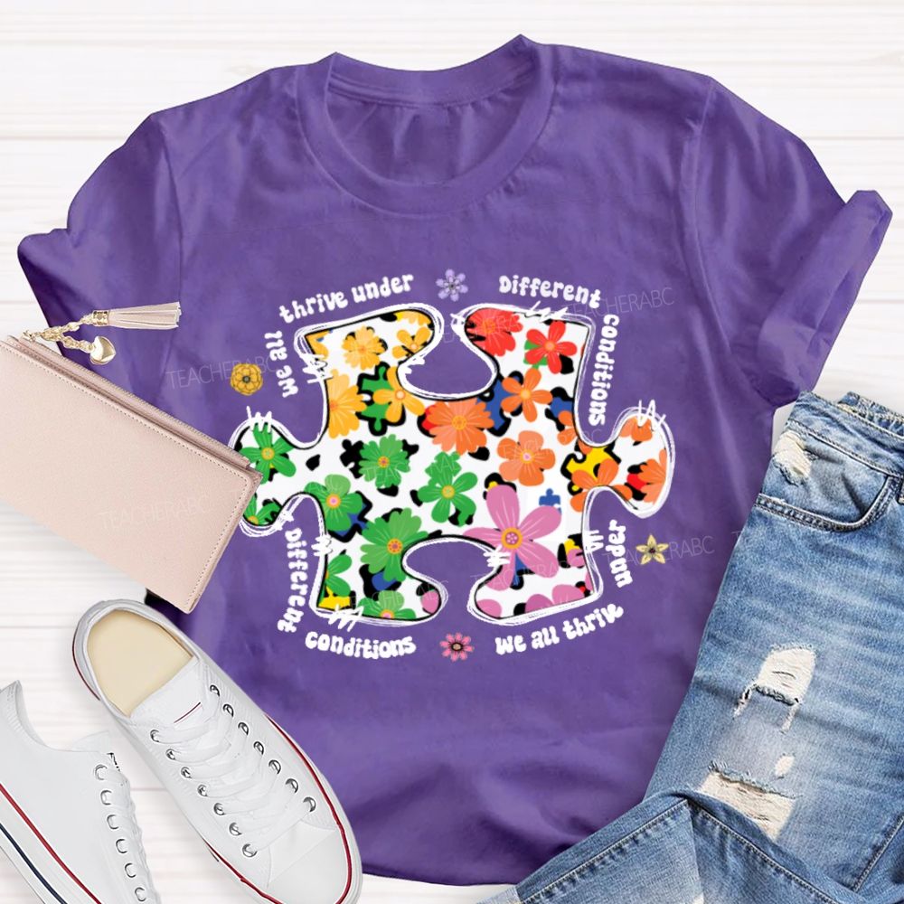 We Are Thrive Under Different Conditions Flowers Puzzle Teacher T-shirt