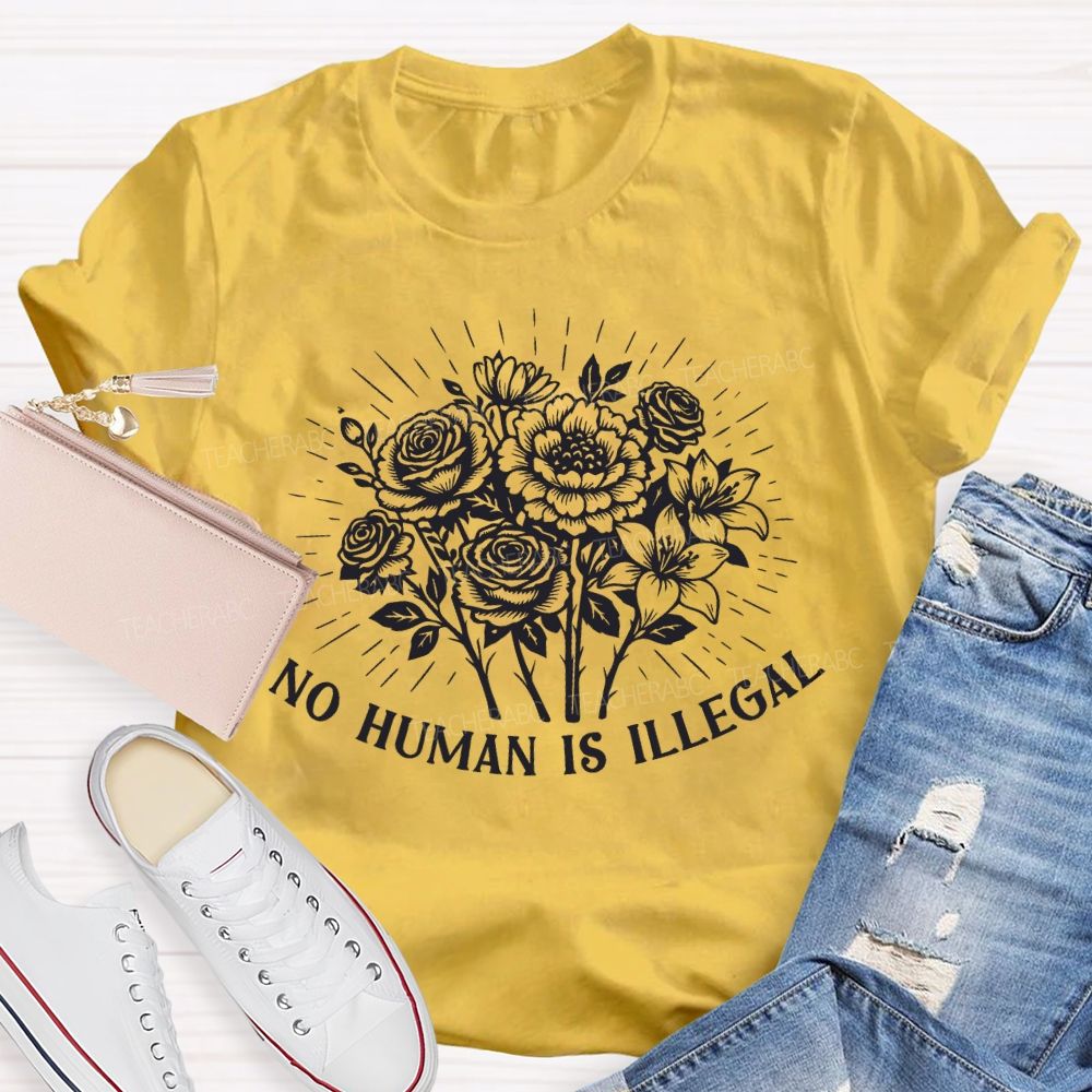 No Human Is Illegal  Teacher T-shirt