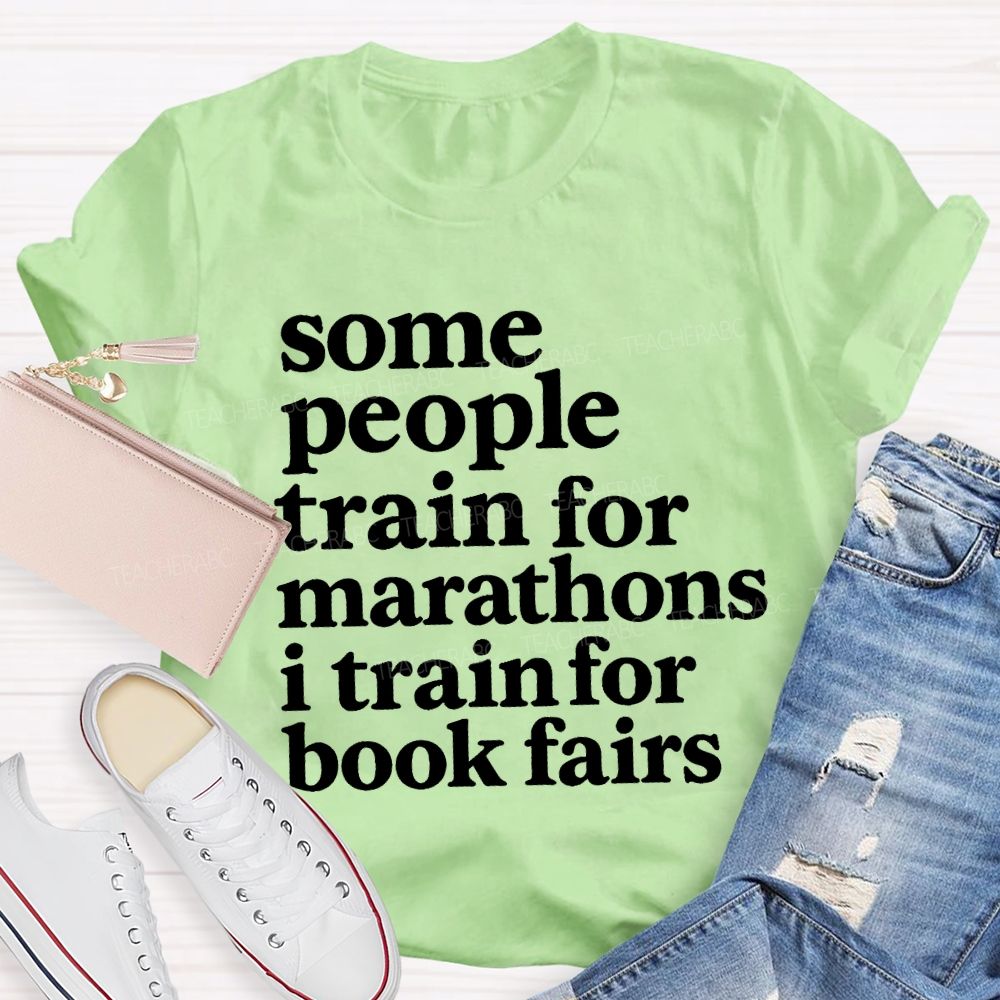 Some People Train For Marathons I Train For Book Fairs Teacher T-shirt