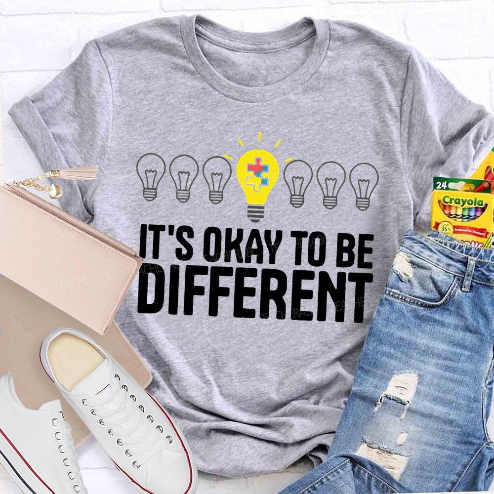 It's Ok To Be Different Puzzle Light Bulb  Teacher T-shirt