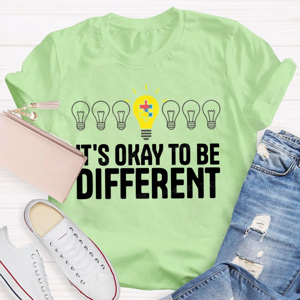 It's Ok To Be Different Puzzle Light Bulb  Teacher T-shirt