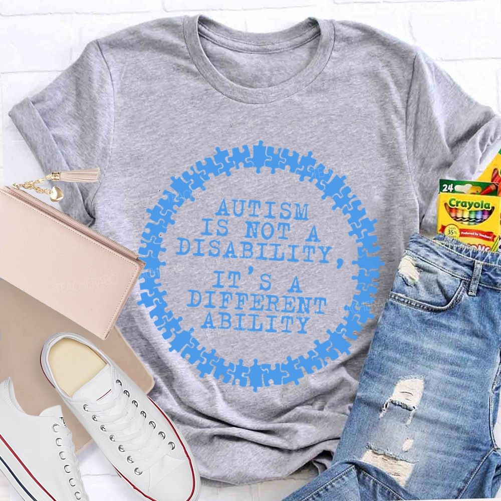 Autism Is Not A Disability It's A Different Ability Graphics  Teacher T-shirt