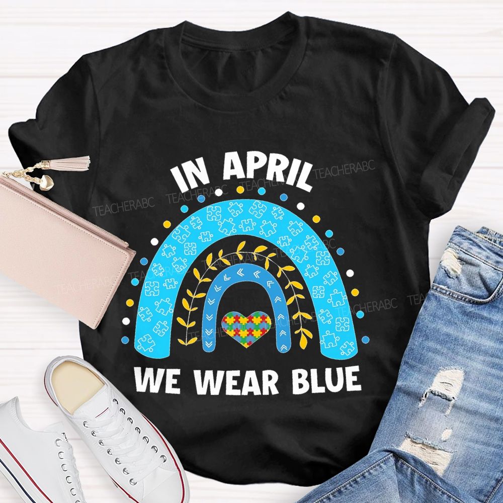 In April We Wear Blue Rainbow Puzzle Heart  Teacher T-shirt