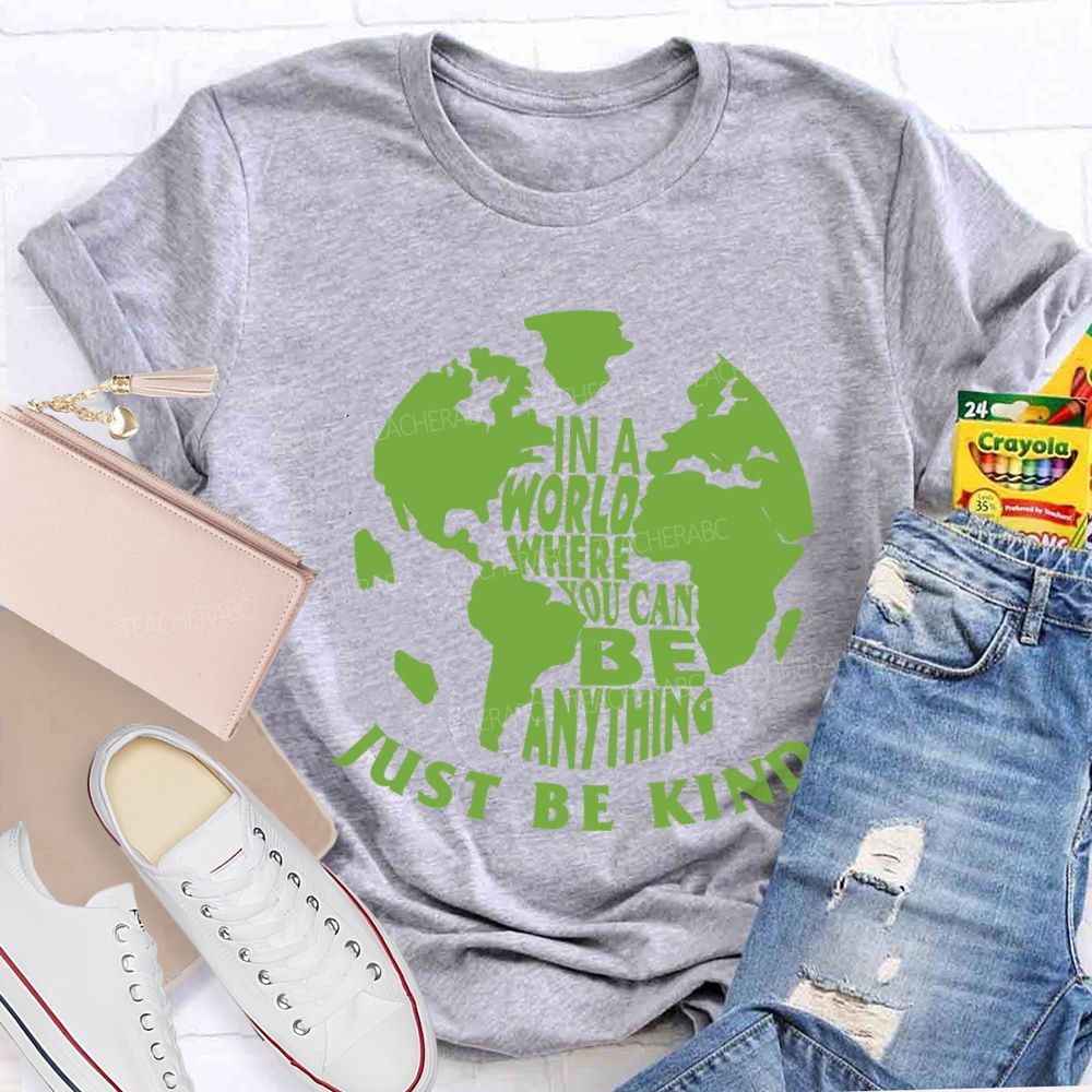 In A World You Can Be Anything Be Kind Earth Day Teacher T-shirt