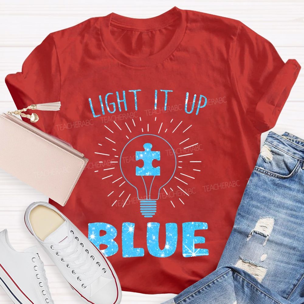 Light It Up Blue Light Bulb Graphic  Teacher T-shirt