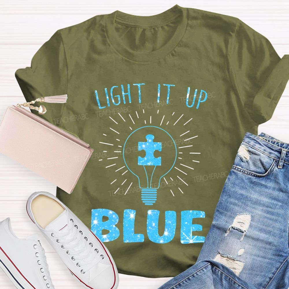 Light It Up Blue Light Bulb Graphic  Teacher T-shirt